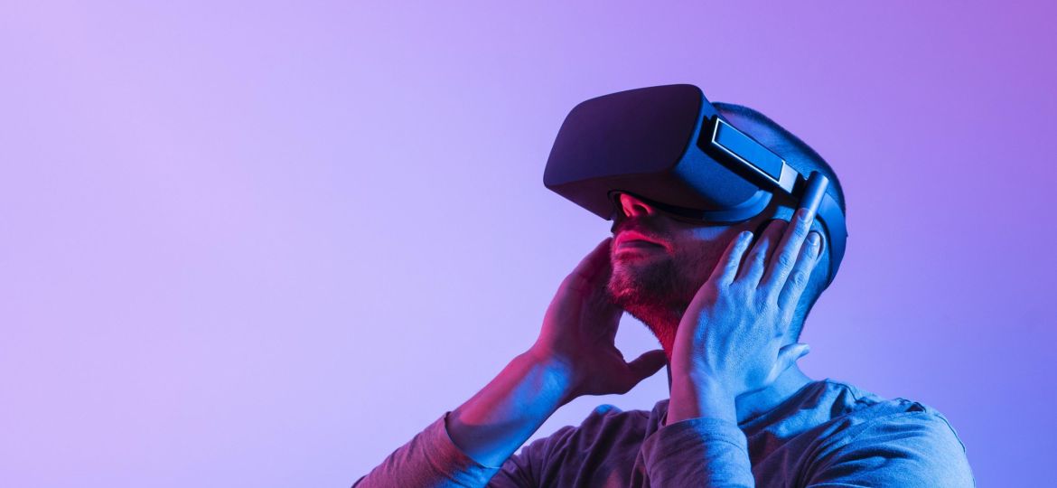 man-with-futuristic-device-medium-shot