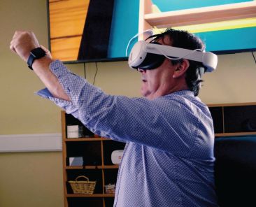 John Costello using a VR headset
